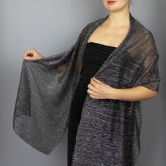 A very elegant soft and a bit stretchy shawl for your wedding party or evening dress. Made of light sparkly fabric, very soft and comfprtable. Color: grey silver Size : 200 cm x 45 cm You can use it as a wrap, shawl or stola. WE have matching bags in our Etsy Shop! WE accept credit cards! Shawls And Wraps Formal Sequins, Grey Wedding Shawl, Silver Formal Shawl, Elegant Silver Shawl For Evening, Metallic Shawl Silver, Metal Accessories, Bridal Shower Gifts, Shawls And Wraps, Bridal Accessories