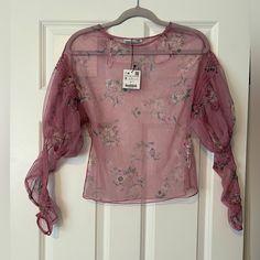 This Fun Blush-Colored Zara Top Is Nwt And Features A Feminine Floral Design With Puffed Sleeves. It Is A Size Small And Comes From A Smoke And Pet Free Home! Zara Top, Puffed Sleeves, Blush Color, Zara Tops, Pink Floral, Puff Sleeve, Long Sleeve Tees, Floral Design, Blush