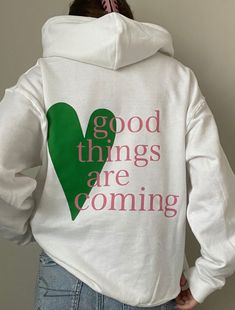 "Cute white, pink, and green hoodie/ crewneck that reads \"Good things are coming\".  Essential for birthdays, Christmas, or just for fun!" Women Crewneck Sweatshirt, Spring Cotton Sweatshirt With Lettering, White Slogan Sweatshirt For Spring, Casual Lettering Sweatshirt For Spring, Spring Everyday Hoodie Sweatshirt, Fun Graphic Print Hoodie For Spring, Trendy Crew Neck Hoodie With Lettering, White Fun Sweatshirt For Spring, Fun White Sweatshirt For Spring