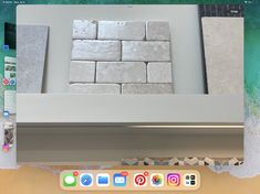 an image of some kind of white tile on the wall in front of a computer screen