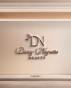 the logo for d'danay morgan beauty, which is located in an upscale building