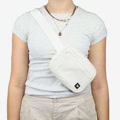 Our Fanny Pack is created intentionally with a slim and stylish design that is perfect for everyday use. It is ideal for those looking for a sleek and cool belt bag to carry only the essentials, whether youre traveling, going to concerts and sporting events, or simply running errands. Casual Belt Bag For Summer On-the-go, Casual Rectangular Belt Bag With Zipper, Casual Rectangular Belt Bag With Adjustable Strap, Casual Rectangular Belt Bag For On-the-go, Casual Belt Bag For Mobile Phone Daily Use, Casual White Belt Bag With Cell Phone Pocket, Casual Chest Bag For Everyday Use In Summer, Casual White Belt Bag With Adjustable Strap, Casual Rectangular Belt Bag