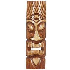 a carved wooden tiki mask on a white background