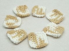 six crocheted squares arranged in a circle