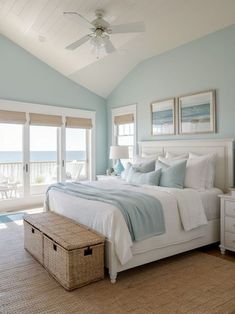 a bedroom with blue walls and white bedding on top of carpeted flooring