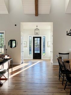 an open floor plan with dining room and living room in the background, instagram from instagram com