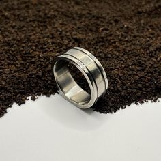 This handcrafted Titanium Ring showcases a timeless design with a comfortable fit. Its hypoallergenic properties make it an excellent choice for anyone, regardless of gender, and it's perfect as a wedding band for both men and women. Minimalist enthusiasts will appreciate its elegant simplicity. The ring featured in the photos is a US size 10 and 8mm wide. Weight of ring: 3-5 grams. Package includes: 1x Ring. 1 x Ring Box.  Packed separately. Enjoy FREE STANDARD SHIPPING across the USA! Each ring is meticulously made by hand, ensuring a unique touch. I don't use automatic or computer-controlled machines; every piece is shaped by hand and made to order, so I don't keep stock. Why choose titanium? It's hypoallergenic, making it safe for those with sensitive skin or metal allergies. Every rin Industrial Ring, X Ring, Titanium Ring, Us Size 10, Ring Minimalist, Minimalist Ring, Titanium Rings, Unique Ring, Minimalist Rings