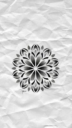 a black and white drawing of a flower on crumpled paper with the words, i love you