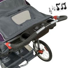 a baby stroller with music notes on the back