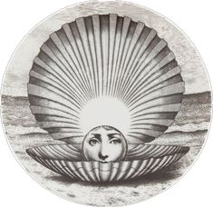 an image of a woman's face in a shell