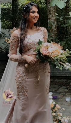 a woman in a wedding dress holding a bouquet