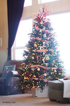 a decorated christmas tree in a living room