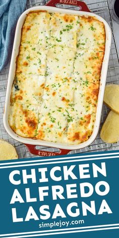 chicken alfredo lasagna in a casserole dish with garlic bread on the side