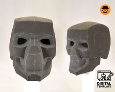 two masks with faces made out of cement, one in the shape of a human head