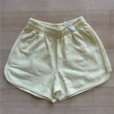 - Madewell Dolphin Hem Shorts Botanical Dye Edition - Color: Daffodil Yellow Solid (Light Pale Pastel Yellow) - Size Small - Regular Fit, High Rise - Easy Pull-On Shorts With A Cool Curved Hem - 100% Regenagri Certified Cotton (Cozy Cotton Terry) - Hidden Drawstrings On Inside Of Waistband - New With Tag, Nwt, Never Worn, No Flaws. Just Prefer Something Shorter. - 12.5” Across Waist (Unstretched), Up To 19.5” Across Waist (Stretched), 11.5” Rise, 4” Inseam, 12.75” Outseam Spring Leisure Bottoms With Elastic Waistband, Comfortable Green Bottoms For Spring, Comfortable Green Spring Bottoms, Spring Leisure Bottoms With Built-in Shorts, Relaxed Fit Bottoms For Leisure In Spring, Relaxed Fit Bottoms For Spring Leisure, Stretch Leisure Shorts For Spring, Comfortable Green Shorts For Spring, Relaxed Fit Yellow Bottoms With Built-in Shorts