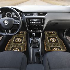 the interior of a car with blue carpet and matching dash mats on the front seats