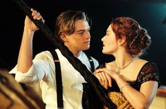 a young man and woman are dancing together in the movie love is blindfolded