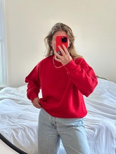 MEASUREMENTS AND ALL AVAILABLE SIZING INFO IS LISTED FOR EVERY ITEM. Please read this section in detail and reach out with any additional questions :) DESCRIPTION: Vintage 90s oversized cherry red sweatshirt. Beautiful condition, soft and comfy. She is in great condition with no noticed physical marks, just some very light pilling.    Tag reads UltraFleece 360 - made in USA - size L (adult) - 50% cotton 50% polyester Recommended for sizes xs-xl depending on desired fit. Model is a size medium-large. Approximate flat lay measurements are as follows:  23" shoulder to shoulder  24" underarm to underarm  28.5"  top of shoulder shoulder to hemline. PLEASE NOTE: There is always a possibility of minor flaws in vintage items due to pre-love wear. We will always mention them in the description abov Red Sweatshirt Outfit, Affordable Red Oversized Sweatshirt, Oversized Red Crew Neck Sweatshirt, Red Oversized Crew Neck Sweater, Red Vintage Crew Sweatshirt, Vintage Red Cotton Sweatshirt, 90s Sweatshirt, Red Sweatshirt, Sweatshirt Oversized