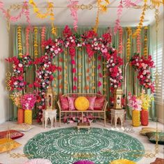 a living room decorated in pink, yellow and green