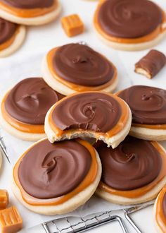 cookies with chocolate frosting and peanut butter on top