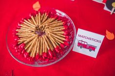 there is a plate with crackers in the shape of a firetruck on it