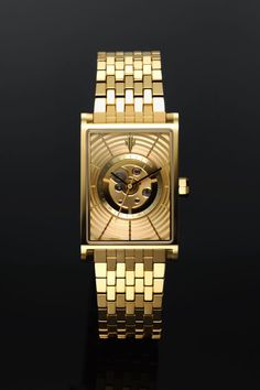 Front of VIEREN Gold Waves Rectangular Watch with mesmerizing 3D radial gold dial Formal Rectangular Skeleton Dial Watch, Formal Rectangular Watch With Skeleton Dial, Timeless Rectangular Skeleton Dial Watch, Timeless Rectangular Watch With Skeleton Dial, Gold Rectangular Analog Watch Accessories, Gold Rectangular Watch With Analog Display, 3d Skeleton, Rectangular Watch, Skeleton Movement