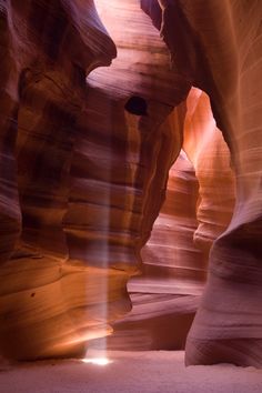 the light shines through the canyon's walls