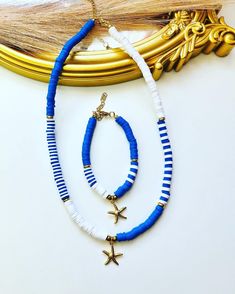 - Polymer clay beads set of adjustable necklace bracelet, blue white heishi necklace bracelet with fish tail charm - Heishi 6mm beads, gold plated stainless steel, hematite beads - The length of charm is 2 cm - The length of necklace is 40cm + 5 cm extended - The length of bracelet is 15.5 cm + 5 cm extended - Add note if you need different length of bracelet and necklace - Colors may appear slightly different on screen due to differences in resolution, brightness, and contrast - More colors ava Blue Nautical Jewelry For Beach, Adjustable Blue Nautical Jewelry, Adjustable Nautical Blue Jewelry, Clay Beads Necklace, Bracelet Heishi, Polymer Clay Beaded Necklace, Jewelry Royal, Clay Bead Necklace, Coastal Jewelry