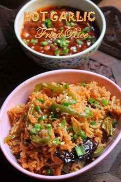 two bowls filled with rice and vegetables next to each other on top of a wooden table