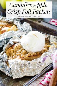 some food is sitting on top of tin foil and has ice cream in the middle