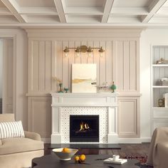 a living room filled with furniture and a fire place in the middle of a room