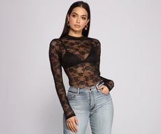 Lace-up in this sultry bodysuit that brings major lace appeal. The bodysuit features a lace bodice. long sleeves. and a sexy strappy back design. Complete your look with a bralette and high waist jeans.Fit & Features High round neckline Long sleeves Sheer unlined Lace bodice Completely sheer. bralette pictured not included Dual snap closure Thong bottom Long Sleeve Lace Bodysuit For Party, Stretch Lace Long Sleeve Bodysuit, Chic Lace Top Bodysuit For Party, Chic Party Bodysuit With Lace Top, Spring Lace Bodysuit For Night Out, Lace Bodysuit For Party, Backless Lace Trim Bodysuit For Night Out, Trendy Sheer Bodysuit For Night Out, Black Lace Closure Bodysuit For Party