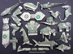 dollar bill origami pieces cut out to look like fighter jets and jet fighters