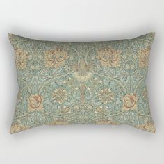 a rectangular pillow with an ornate design on it