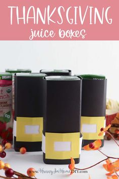 three black and yellow boxes with the words thanksgiving juice boxes on them, in front of some