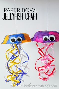 paper bowl jellyfish craft with googly eyes and streamers hanging from the ceiling