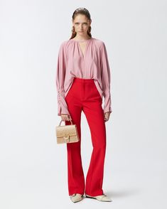 Flowing blouse in silk-blend crepe de Chine. Round neck with V-opening at the front and buttoned keyhole fastening at the back. Long raglan sleeves with a row of buttons at the end that gather the fabric. Chic Spring Blouse With Notched Neckline, Feminine Viscose Blouse For Workwear, Spring Formal Silk Crepe Blouse, Versatile Blouse With Blouson Sleeves For Work, Elegant Crepe Blouse For Work, Versatile Viscose Blouse For Evening, V-neck Pleated Sleeve Work Top, Elegant Split Neck Office Blouse, Chic Viscose Top With Split Neck