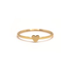 A modern tiny heart on a classic thin band. A must-have for Stacker Rings. Thick 14K Gold plating will make this ring last a lifetime! Gold Vermeil Hypoallergenic, lead and nickel free Heart Height 3.5mm Band 1mm #R108 Rings Thick, Plain Rings, Gold Heart Ring, Stacker Rings, Tiny Heart, Mini Heart, Small Heart, Heart On, Gold Plating