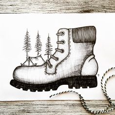 a drawing of a pair of boots with a boat in the woods on top of it