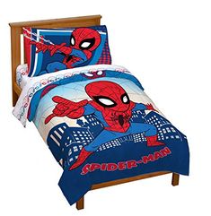 a bed with spiderman comforter and sheets on top of it, in front of a white background