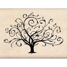 a tree with swirls on it is painted on a piece of parchment paper,