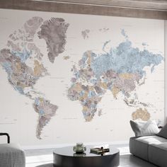 a living room with a large world map on the wall