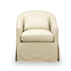 a beige chair with a white pillow on it's back and footrests