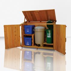 an open wooden box containing several different types of trash cans