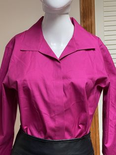 "Beautiful Y2K modern vintage hot fuscia pink shirt / blouse.  Front buttons has chic covering panel.  Three-quarters sleeves with rolled cuffs.  Lovely soft shawl collar with gently pointed tips.  Gorgeous workwear / job interview shirt that looks great as casual wear too! Unisex adult / gender neutral.  💥Condition: Excellent vintage condition.  💥Material: Cotton  Please see measurements before buying.  💥MEASUREMENTS💥 Measurements are taken while the garment is lying flat. Please double where appropriate for actual dimensions. Approximate Measurements (lying flat, buttoned): Width Armpit to Armpit: 20.5\" Width of Bottom Hem: 21\" Length from Shoulder Top to Bottom Hem: 24\" Please be sure the approximate measurements are a good fit for you. We're happy to answer questions or provide Pink Long Sleeve Blouse With Buttons, Fitted Solid Color Blouse With Placket, Pink Long Sleeve Blouse With Button Cuffs, Fitted Blouse With Buttons And Lapel Collar, Fitted Blouse With Lapel Collar And Buttons, Chic Pink Blouse With Spread Collar, Pink Fitted Button-up Blouse, Pink Spread Collar Shirt For Office, Pink Collared Top With Button Closure