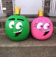 two pumpkins with faces painted to look like cartoon characters