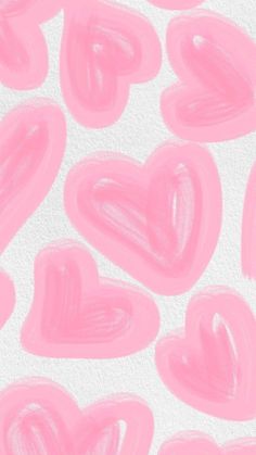 some pink hearts on a white background