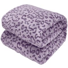 two purple leopard print blankets stacked on top of each other