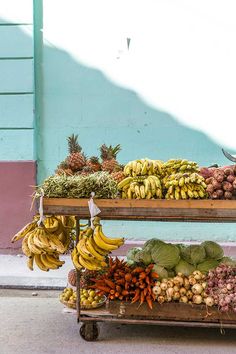 an assortment of fruits and vegetables are on display