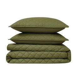 four pillows stacked on top of each other in olive green linens and quilting